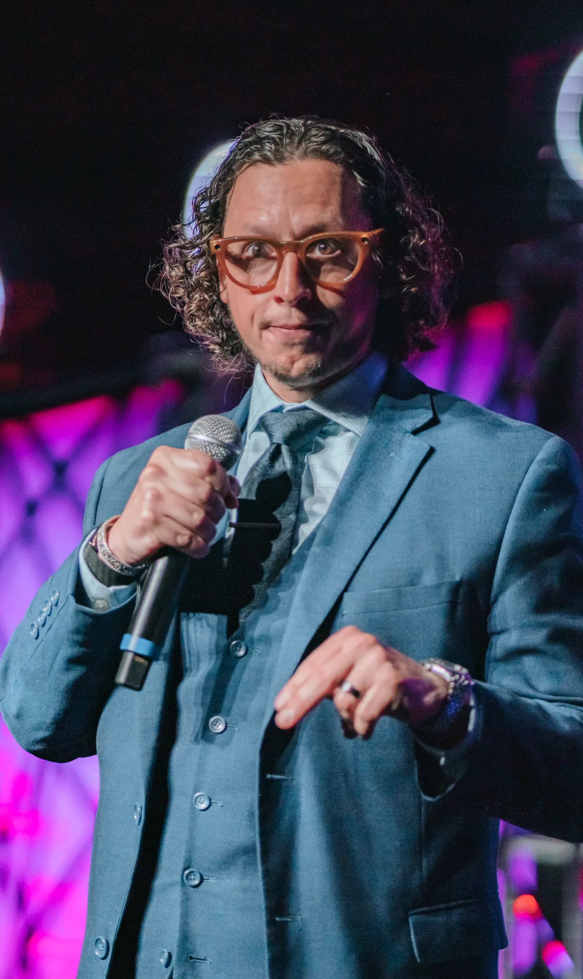 Anthony Spark speaking on stage